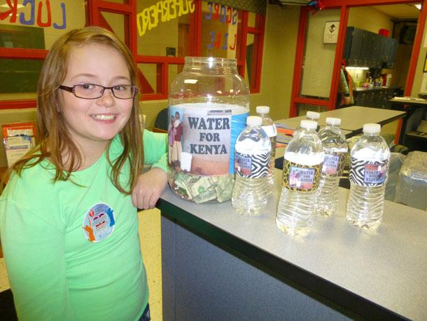 Starside Elementary student Riley Harmon-Moore helped sell water bottles to peers to raise funds for Starside's sister school.