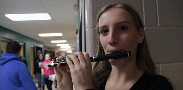 Sophomore Jaycie Theamert practices her piccolo after band class. In band she plays both the piccolo and flute and excels at both instruments.