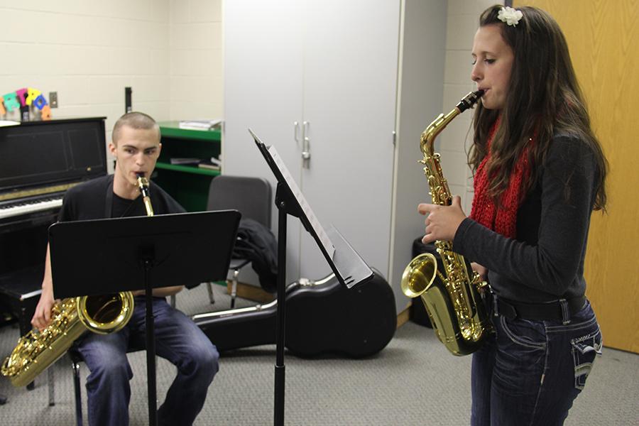 Junior Jared Schneider and Senior Mackenzie Lancaster rehearse their quartet for the State competition. Their performance received a I rating which is the highest rating possible.