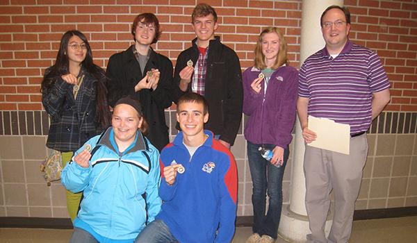 The DHS Scholar’s Bowl team that took first place at the Eudora Tournament on Nov. 19. Pictured are (bottom row) Aubrey Heer and Nick Mechler; (top row) Jebbie Cavanaugh, Erick Sherman, Lance Erickson, Lexi Pasquale and sponsor Phillip Hamilton