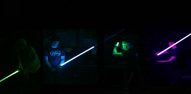 Members of the proposed Start Wars club pose with their Lightsabers May 14.