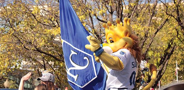 Kansas City Royals mascot, Slugger, waves a KC flag during the World Series championship parade held in downtown Kansas City on Nov. 3. 