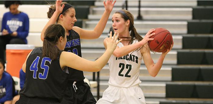 Senior guard Kristen Saucerman looks for an open teammate during the Wildcats game vs Olathe Northwest during the Huhtamaki Hardwood Classic on Dec. 11.