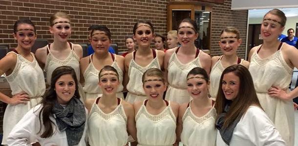 The Diamonds Dance poses with coaches at the Miss Kansas Dance Festival after competing.