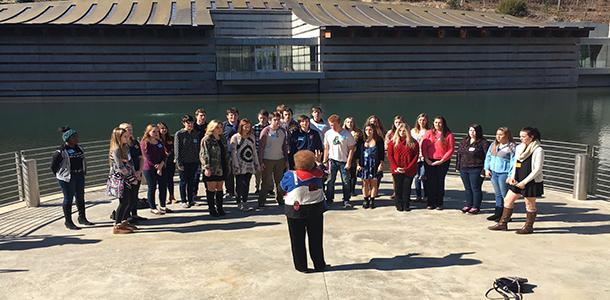 Madrigal students performing at the Crystal Bridges Museum of Art under the direction of Mary Etta Copeland on Feb. 5.