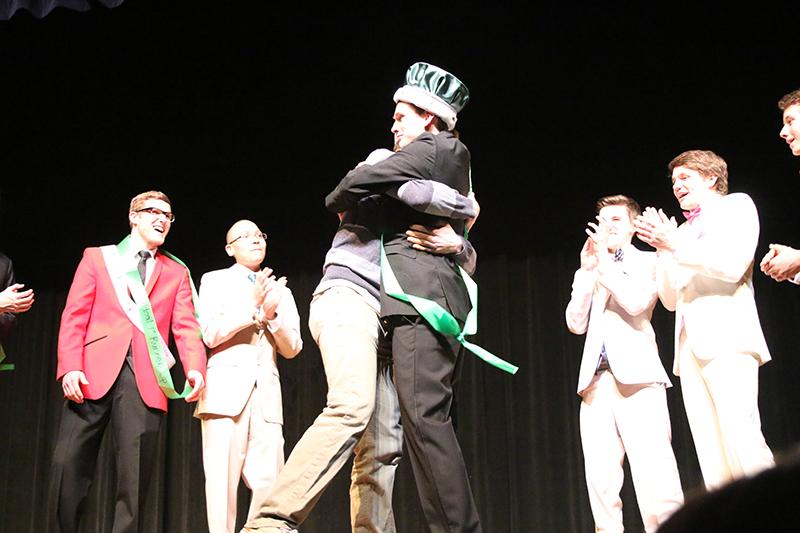 Former Mr. Wildcat Evan Sullivan and current Mr. Wildcat Connor Strouse celebrate Strouse's win at the pageant on Feb. 17. Photo by Rex Templin. 