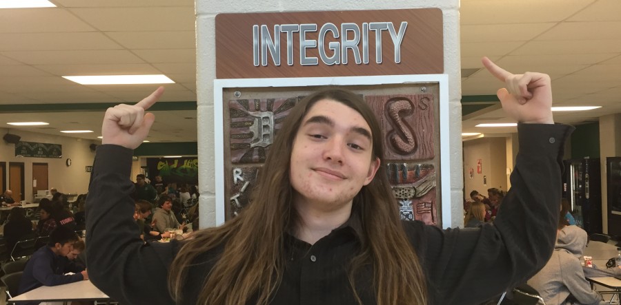 Junior Shane Thompson poses during lunch on March 28.