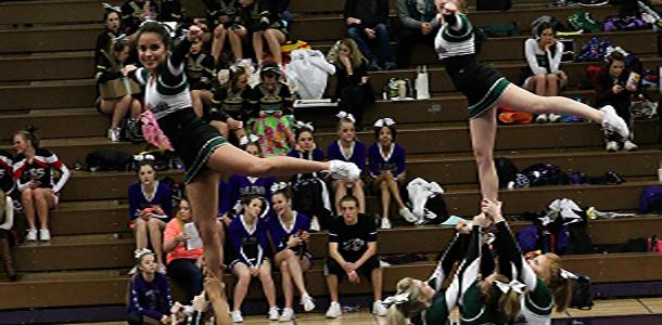 DHS cheer team preforming at the Baldwin Cheer and Dance Festival.