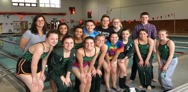 Girls' swim team competes with new coach