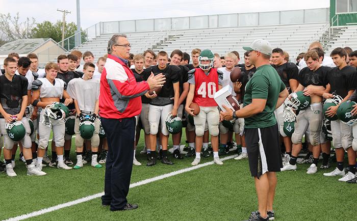 Former Chiefs player Gary Spani gives a speech to the football team as he presents Coach Brian King the award for Coach of the Week on Wednesday, Sept. 14.