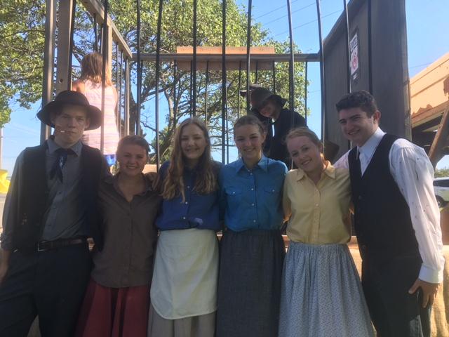 Students Caleb Daniels, Emily Meyer, Aspen Grieshaber, Kennedy Forshey, Faith Smith Johnny Meehan and Trey Grieshaber pose in their costumes at the De Soto Days festival on Sept. 3. 