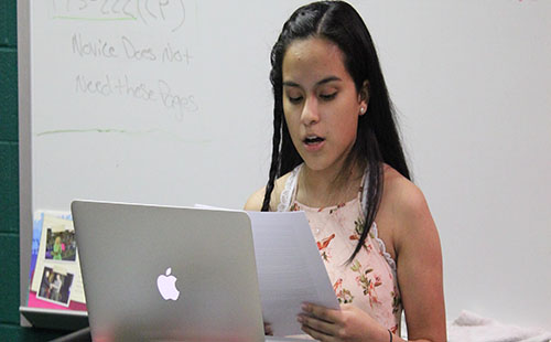 Sophomore Aylin Rocha speaks at mock debate tournament at De Soto High School on Sept. 17.