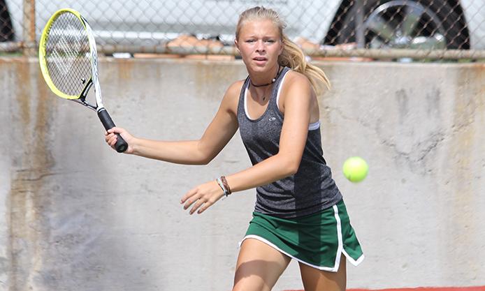 Junior Carly Bodenhausen prepares to hit a forehand during pool play at the Baldwin Invitational, Sept. 14.