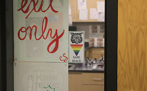 A safe space card hangs in the window of science teacher Laura Sixta.