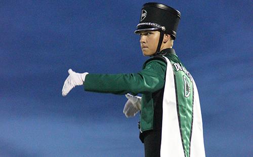 Senior Ryan Wollum conducts the Wildcat band at halftime on Sept. 2. 