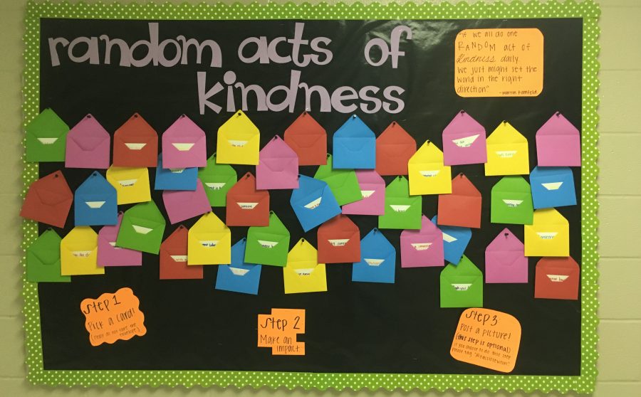 The Random Acts of Kindness board is displayed in the FACS hallway across from FACS teacher Caroline Friday's room. Students can come to the board, pick a card and follow the instructions given to show a friend a random act of kindness.