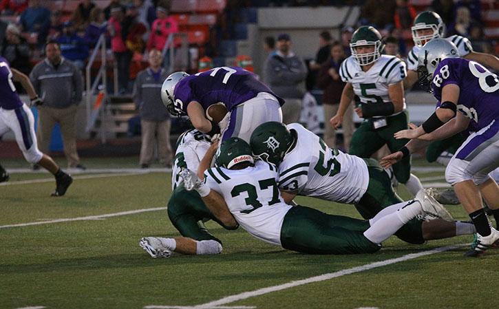 The De Soto defense tackles a Baldwin running back on Oct. 7. DHS eventually won 43-0 over BHS.