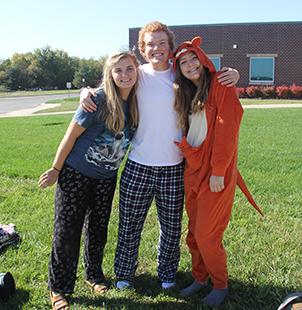 Left to right: Lizzy Arnold, Simon Couch and Aspen Grieshaber participate in pajama day on Oct. 18.