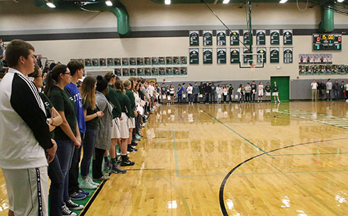 179 students stand with their academic letters during the ceremony on Dec. 2