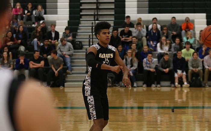 Senior Andrew Dowdy competes with the Goats recreational basketball team in a special game hosted by DHS in January 2016.