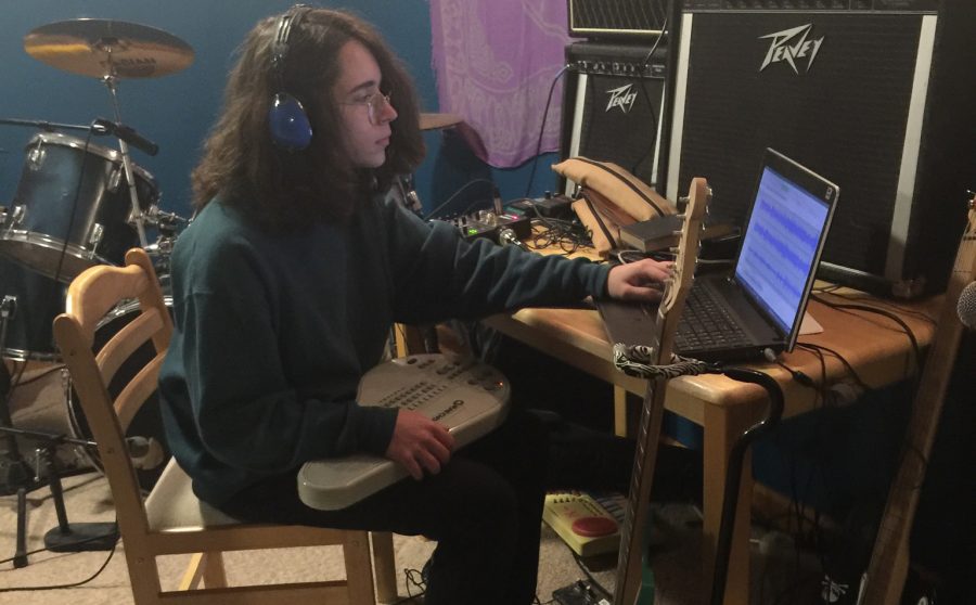 Junior Quinton Marschall works on recording a song for one of his albums.