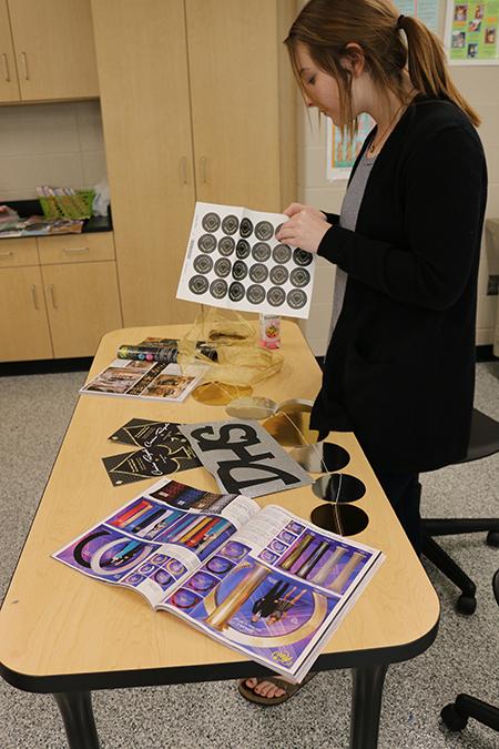 Junior prom committee member Holly Capling plans decorations Feb 1. for Prom.