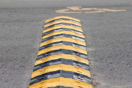 A Speed Bump positioned outside of De Soto High School