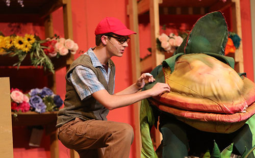 Senior Ryan Wollum practices at the musical dress rehearsal on May 10, the day before opening night. 