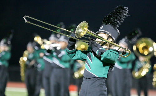 Junior Savannah Stine plays her trombone solo on Friday, Oct. 6