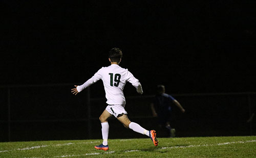 Junior Edwen Diaz runs down the field, awaiting a pass on Oct 24.