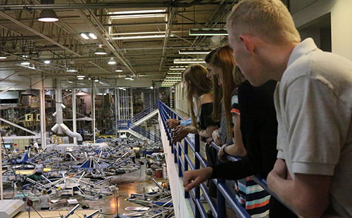 DHS students look out over the floor at t-shirt printing taking place.