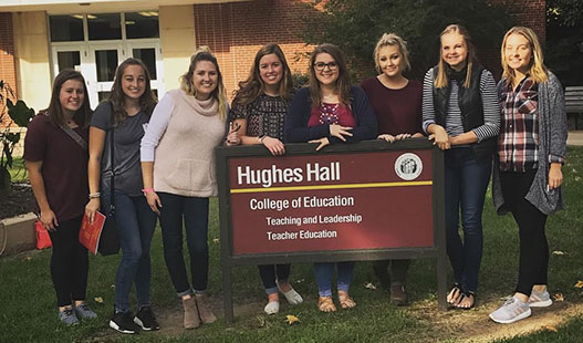 Seniors Rachael Hopkins, Savannah Steinmets, FACS teacher Caroline Friday, Seniors Payton Faddis, Makayla Mathies, junior Kaylee West and senior Holly Capling visit the College of Education at Pittsburg State University on Oct 19.