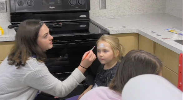 Students participate in Toddler Day