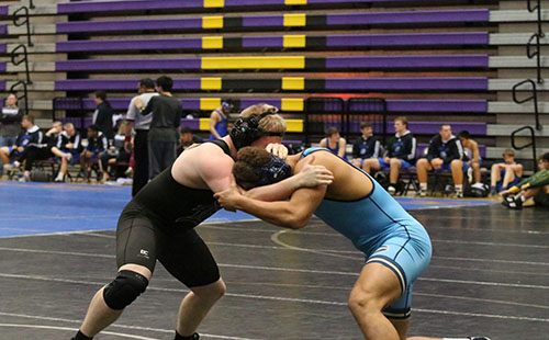 Junior Zach Toburen wrestles his opponent at Spring Hill High School on Dec. 1. 