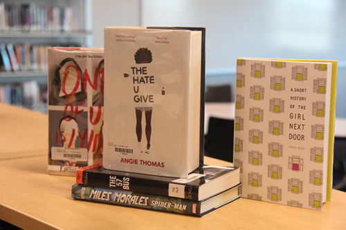 The De Soto library features several of Jennifer Sosna and Amanda Sweet's recommended books for those who set New Year's goals to read more, including "The Hate U Give," "One of Us Is Lying," "The 57 Bus" and new book additions such as "A Short History of the Girl Next Door" and Miles Morales's "Spider-Man."