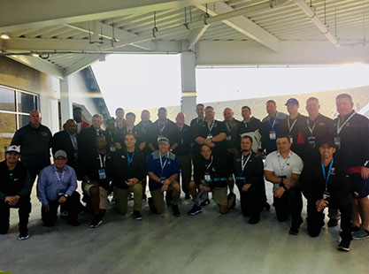 De Soto High School head football coach Brian King poses for a picture with fellow Don Shula Coach of the Year nominees at the NFL Pro-Bowl on Jan 28.