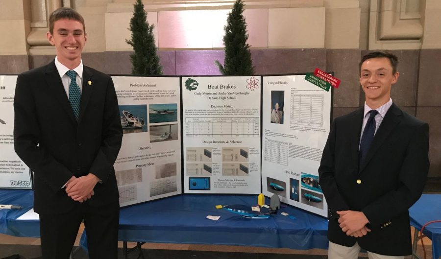 Seniors Andre Vanmeerhaeghe and Cody Moose pose by their presentation of their prototype of Boat Brakes at Union Station on April 25.