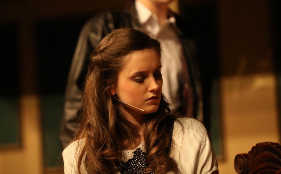 Junior Emma Leonard acts in the winter play, "And Then There Were None" on Feb. 28.  