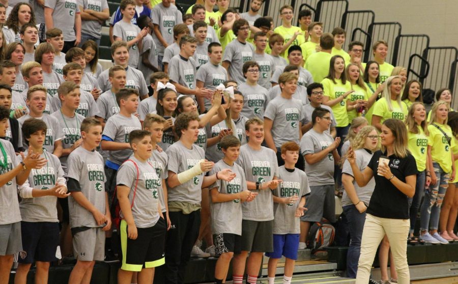 Freshmen and A&M Crew members sing and clap along with the school fight song at the Freshman Day assembly on Aug. 14.