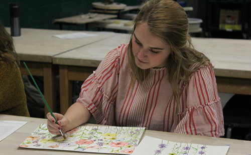 Senior Madeline Merckling works on her art in AP Studio Art on Aug. 30, 2018. You can find more of her artwork at mjmerckling.com or on her business Instagram: @mjmerckling