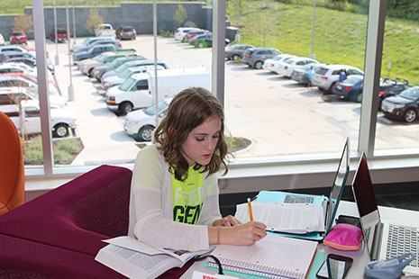 Junior Mason Johannes works on homework at the Monticello Library on Aug. 23.