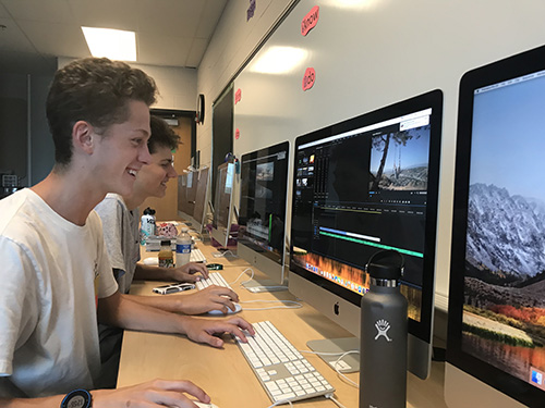 Juniors Chase Culver and Colin Campbell edit their videos for their upcoming project in Video Production on Aug. 24.