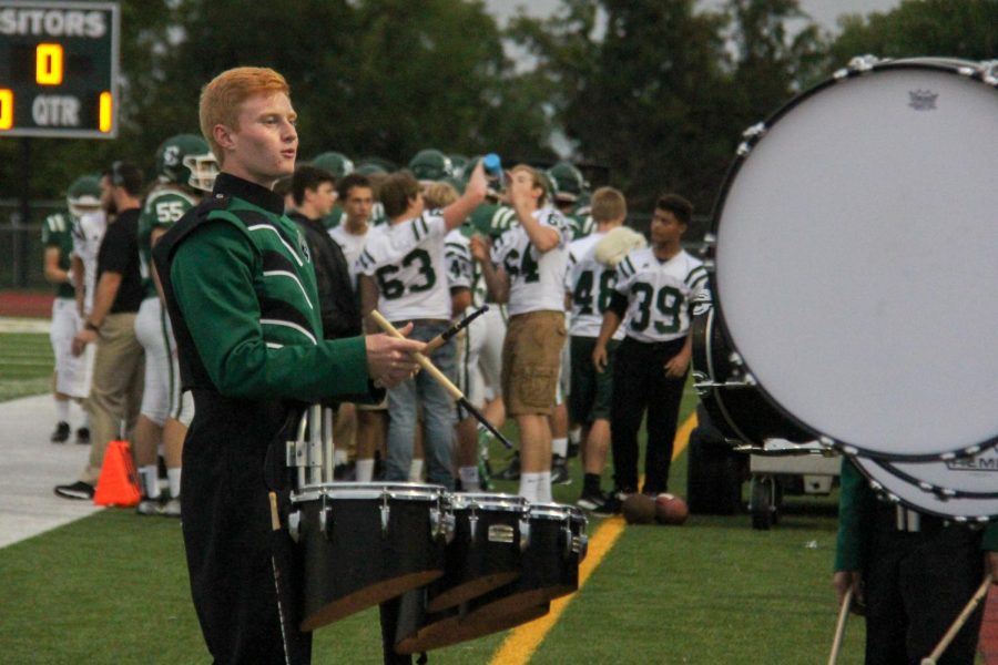 Junior Cody Adams plays marching quads in the home football game on September 7.