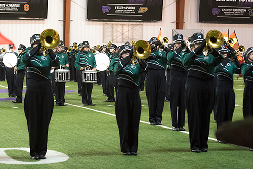 The mellophones perform at attention during the performance on Oct. 6. 
