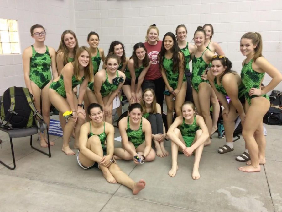 Varsity girls swim team pose for a picture at the Bonner Springs Meet on April 9, 2019.