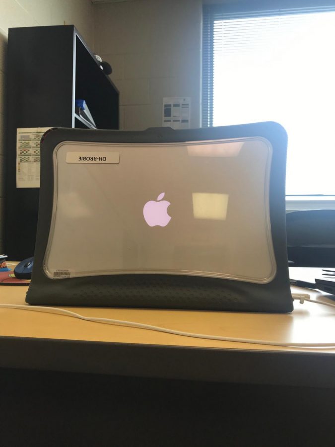 Social studies teacher Ryan Robie’s new MacBook with the protective cover on it. 