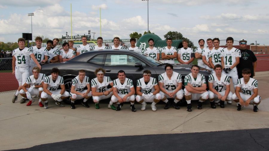 Members of the De Soto High School football team pose for a picture at the annual Fall Fest on Aug 24. 