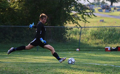 Senior varsity goalkeeper Eli Gratz takes a goal kick in the Wildcats season-opening home contest vs. Topeka-Seaman on Sept. 3. 