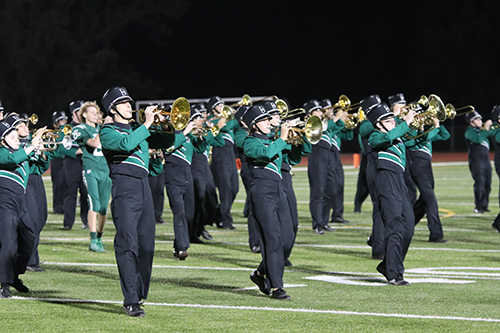 The De Soto high school marching band performs during halftime at the Homecoming game on Oct. 18, 2019. 