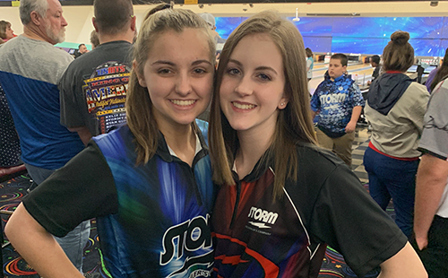 Seniors Mason Johannes and Maddy Calvello pose at the Kansas City Open youth-adult tournament in Belton, MO in April 2019.